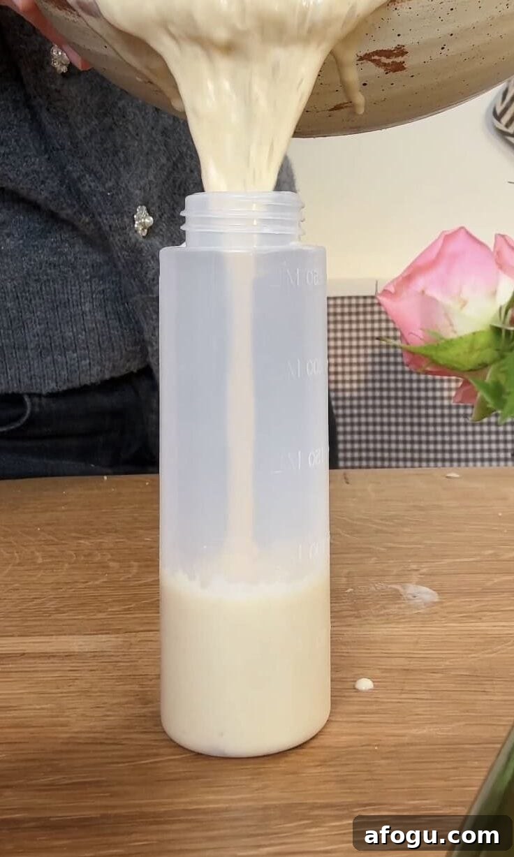 Polish Racuchy: Classic Apple Pancake Recipe You’ll Love 11 pouring the batter into a squeezy bottle.