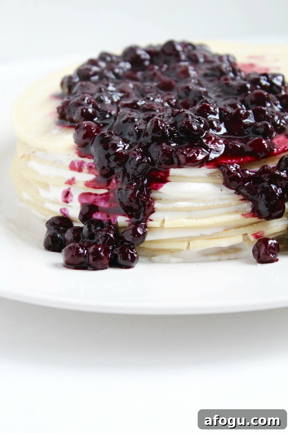 Gluten Free Crepe Cake Recipe & Blueberry Topping on White Plate