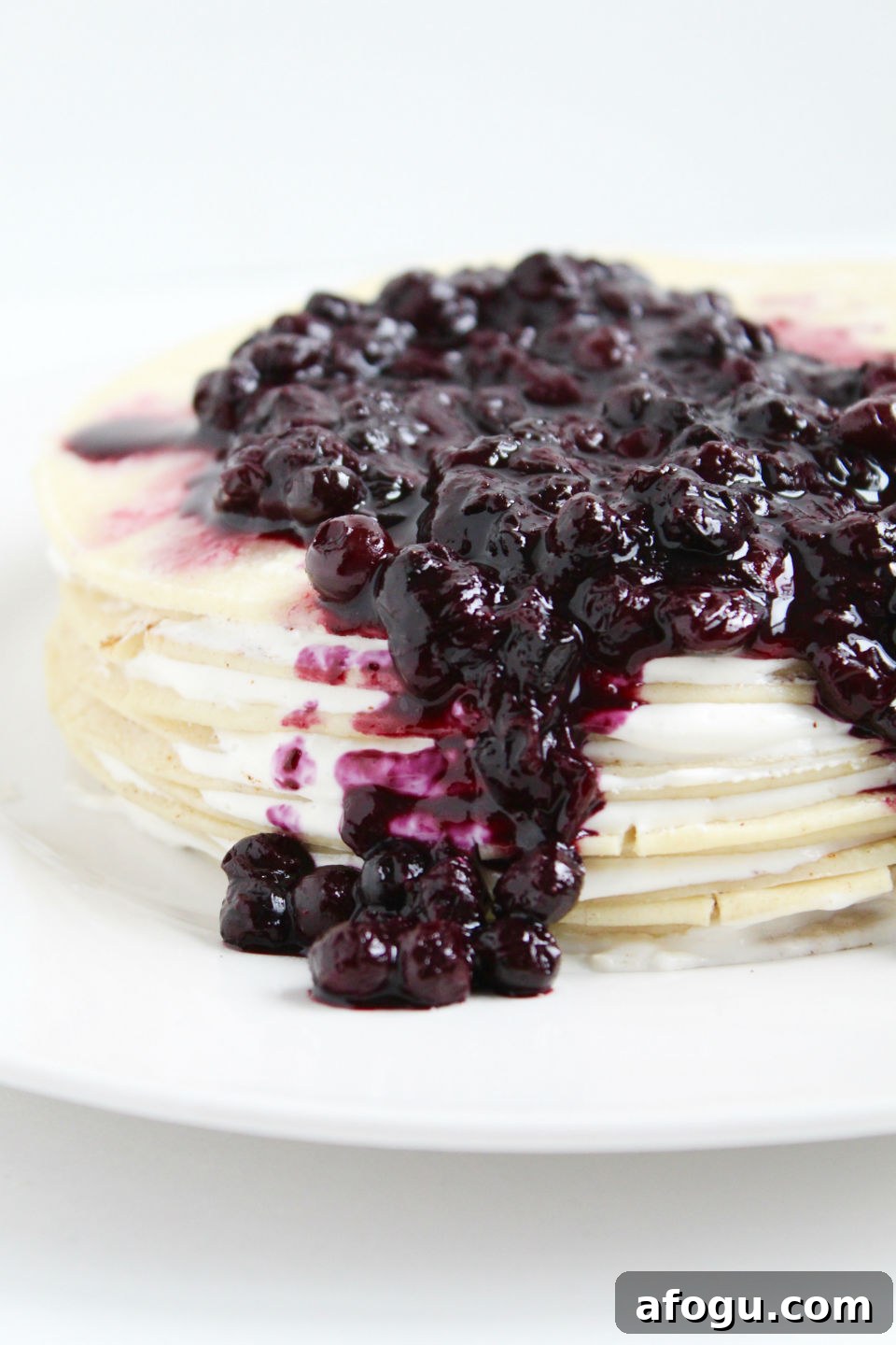 Gluten Free Crepe Cake Recipe & Blueberry Topping Flowing Down Side