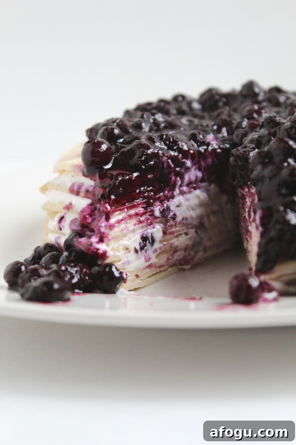 Gluten Free Crepe Cake Recipe & Blueberry Topping with Slice Missing