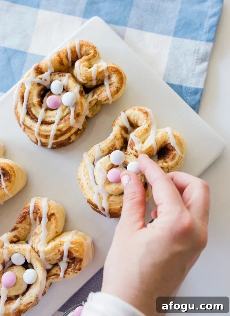 Bunny cinnamon rolls with icing and M&M decorations