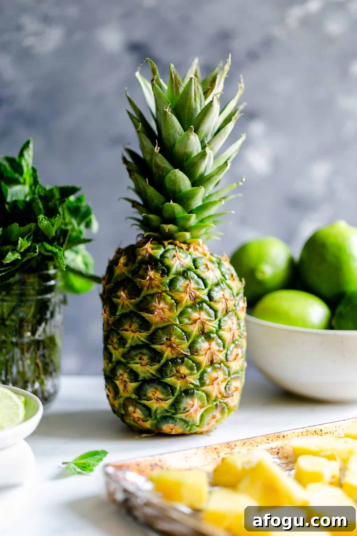 large fresh pineapple and some fresh mint