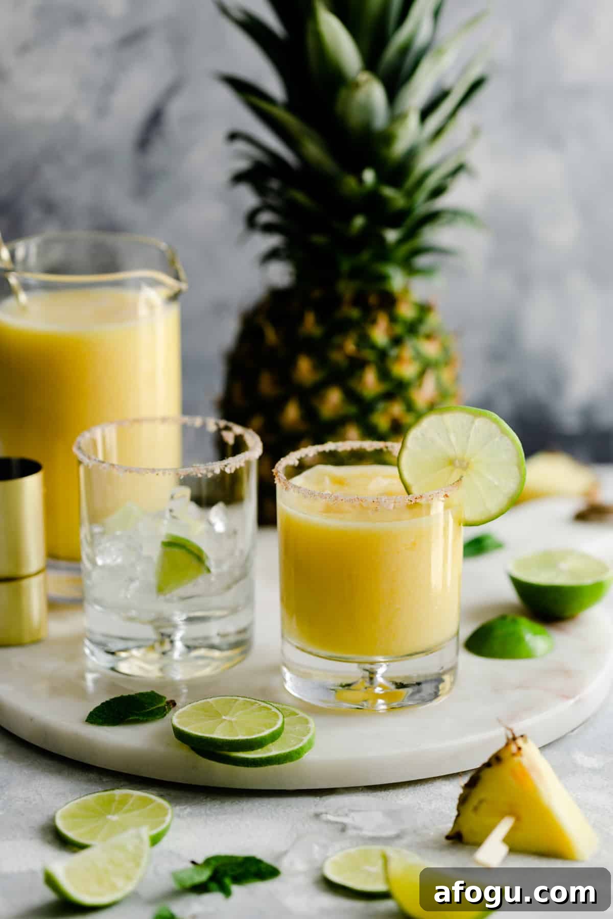 short glass with frozen cocktail on a marble board