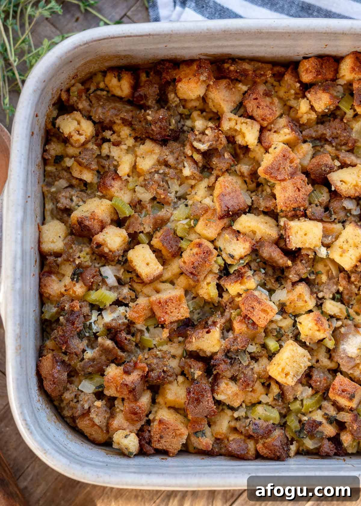 an overhead view of 1/3 of a pan of sausage stuffing
