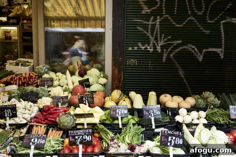 Top Vienna Markets: Where to Shop Local Food, Crafts & Gifts 3 Produce on display at Rochusmarkt, Vienna, including squash, green onions, and tomatoes.