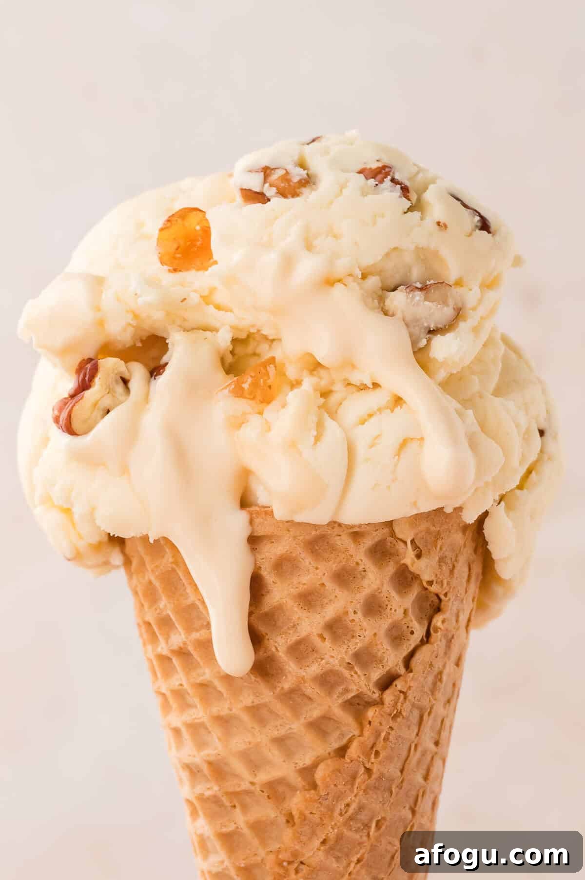Maple pecan ice cream in an ice cream cone.