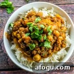 This super flavorful vegan chickpea curry with eggplant makes a spiced, warm light dinner that will keep you satisfied after a long day at work.