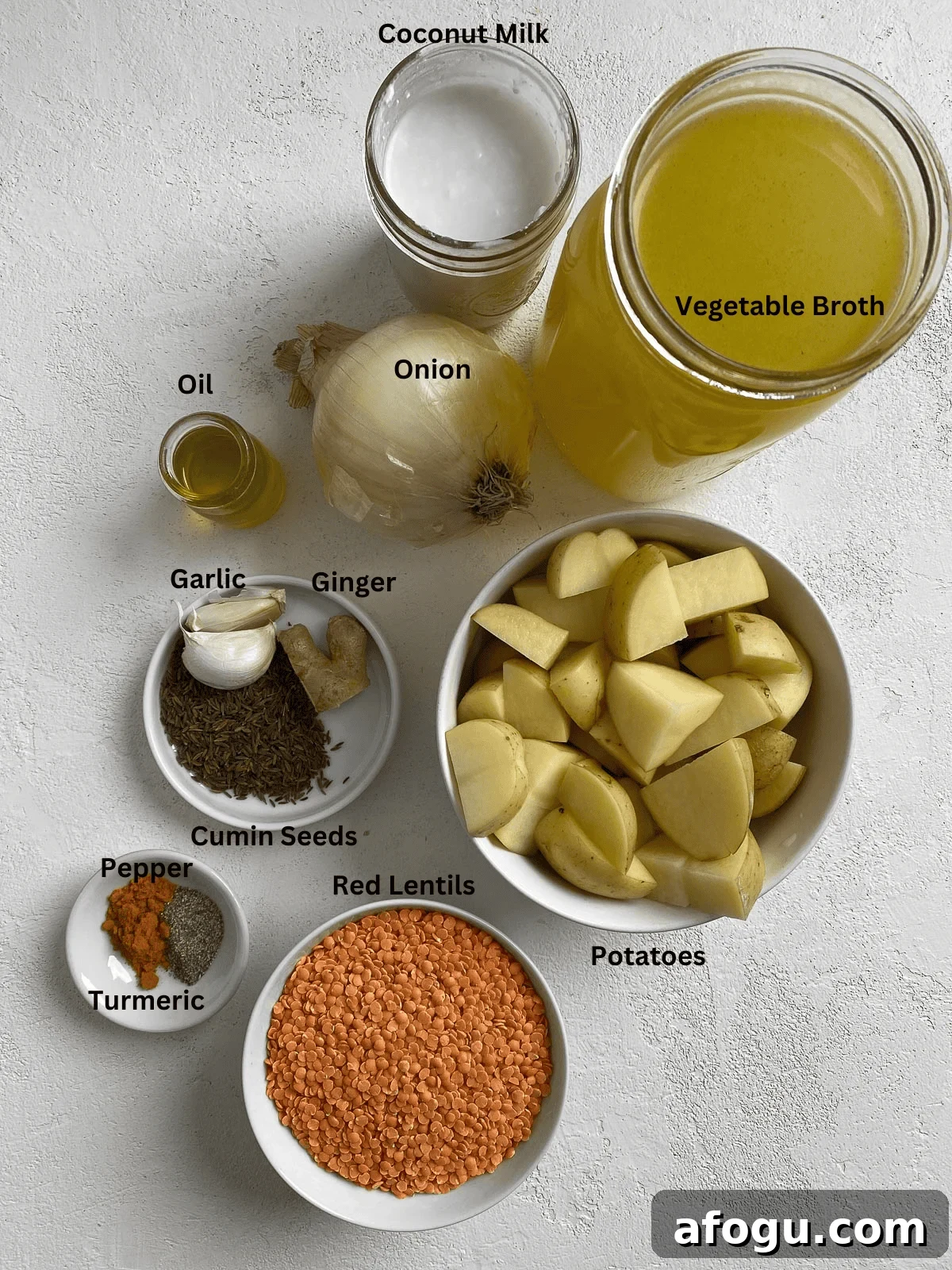 ingredients for Lentil Potato Soup measured out against a white surface