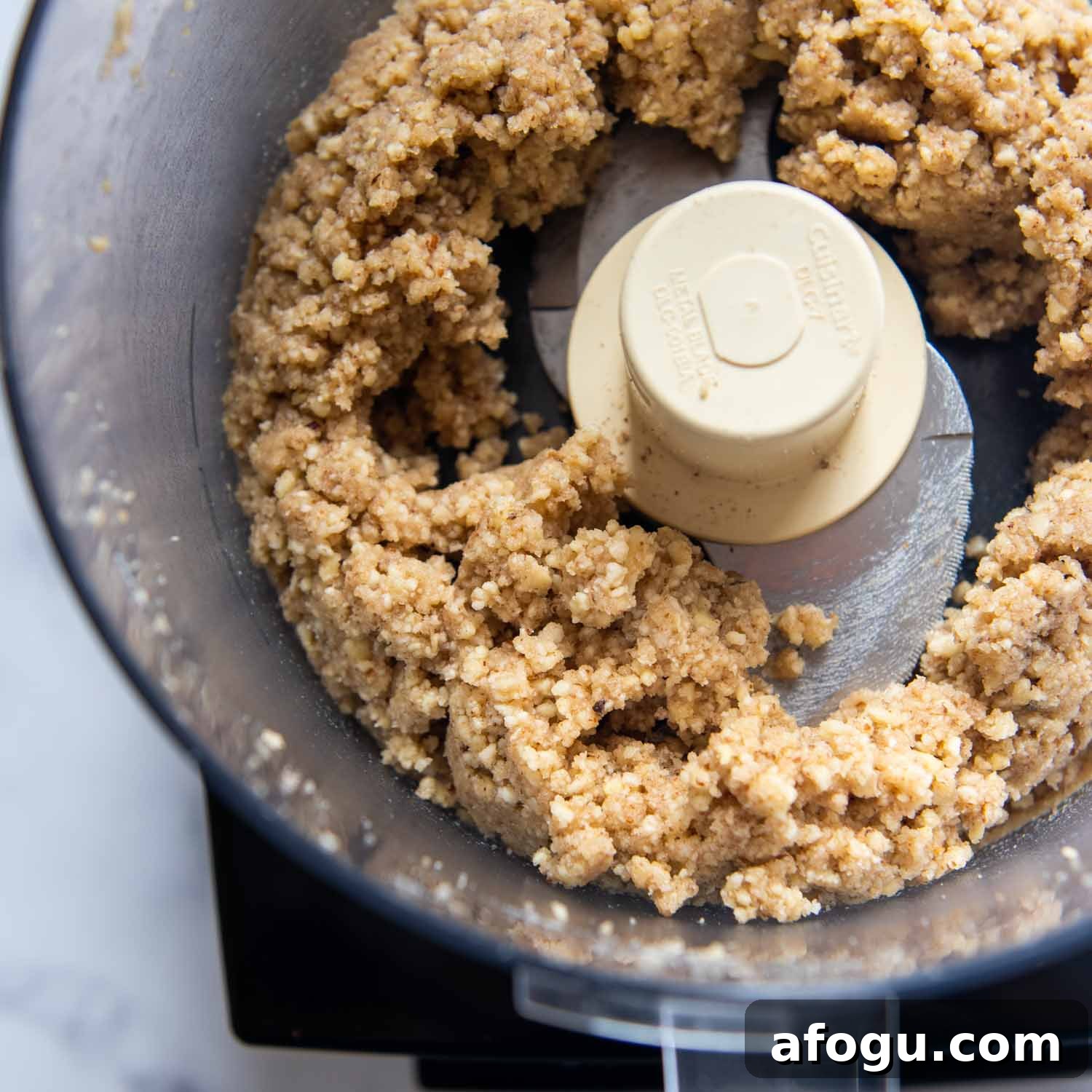 the ingredients combine together in a food processor.