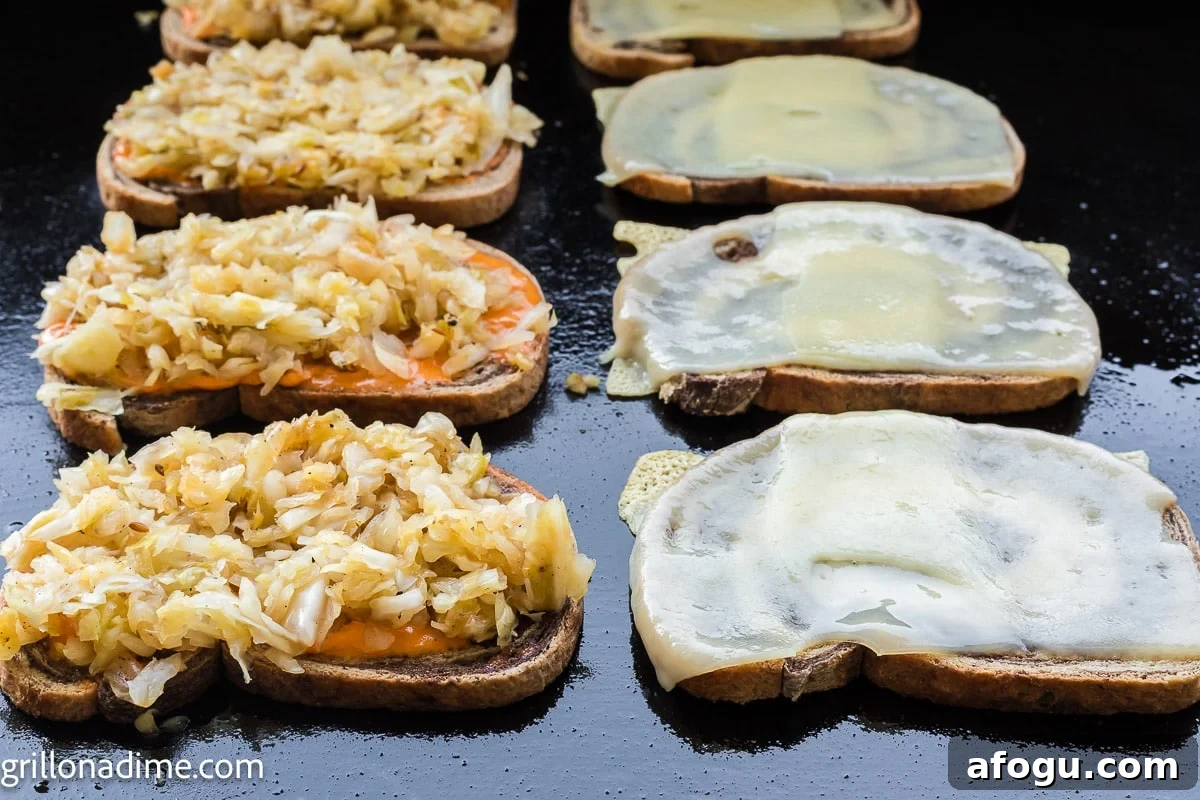 Rye bread on the griddle with melted cheese and sauerkraut