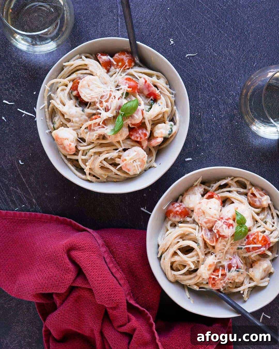 Two bowls of gluten free shrimp carbonara.