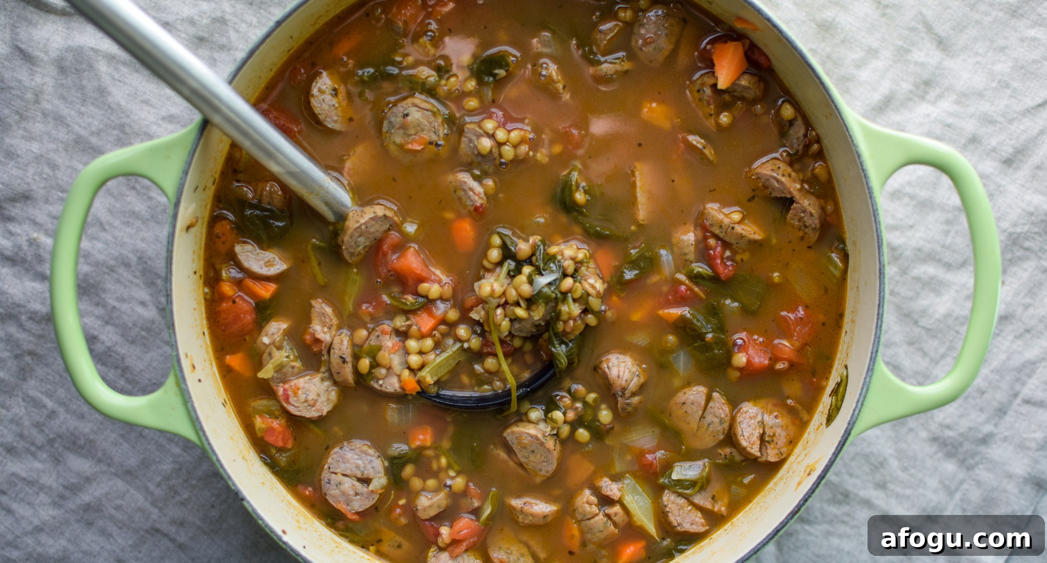 Vegetable & Chicken Sausage Lentil Soup recipe - Simple, hearty and delicious fall soup that will make your home smell amazing on any week night! ProjectMealPlan.com