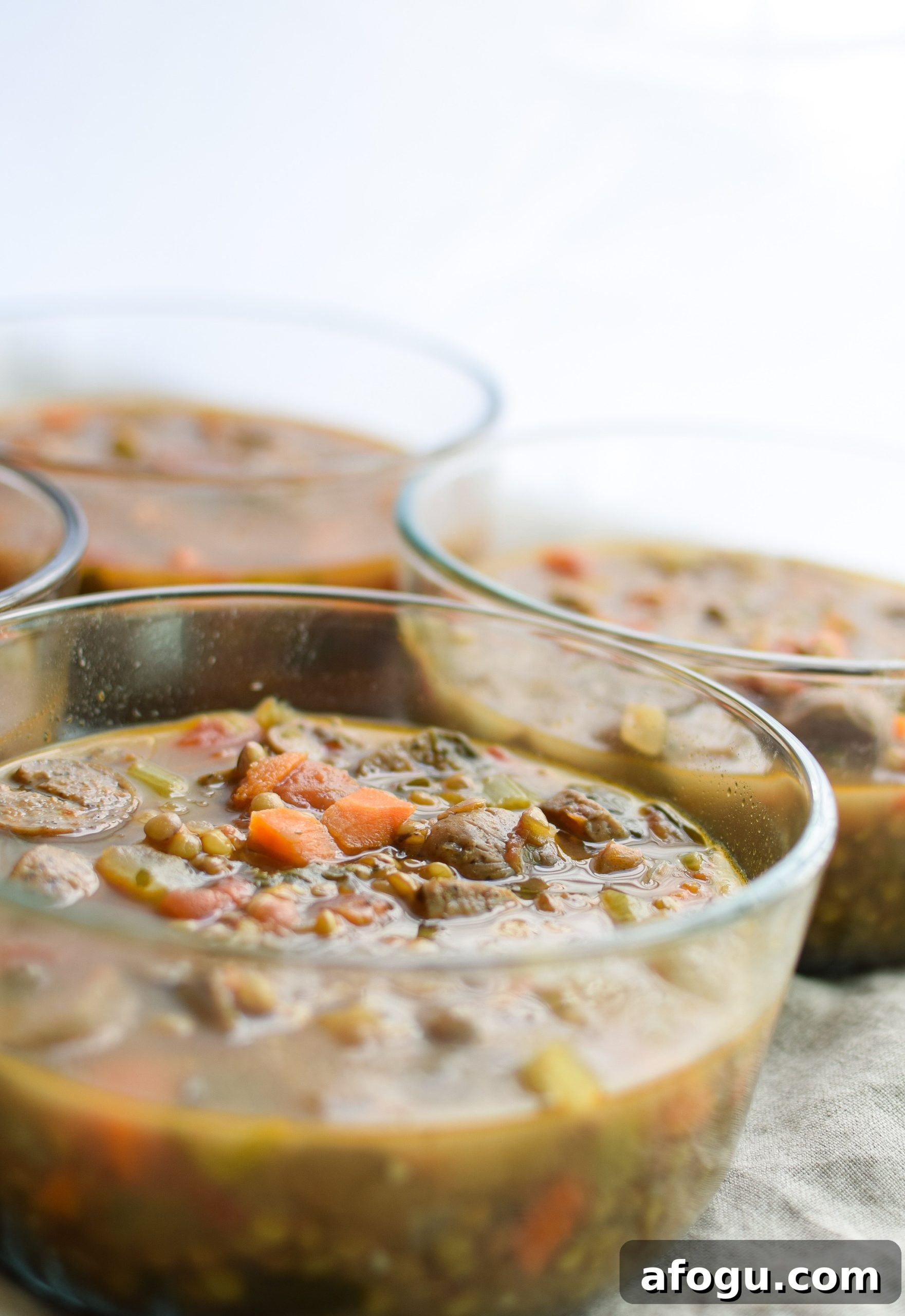 Vegetable & Chicken Sausage Lentil Soup recipe - Simple, hearty and delicious fall soup that will make your home smell amazing on any week night! ProjectMealPlan.com