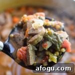 Vegetable & Chicken Sausage Lentil Soup recipe - Simple, hearty and delicious fall soup that will make your home smell amazing on any week night! ProjectMealPlan.com