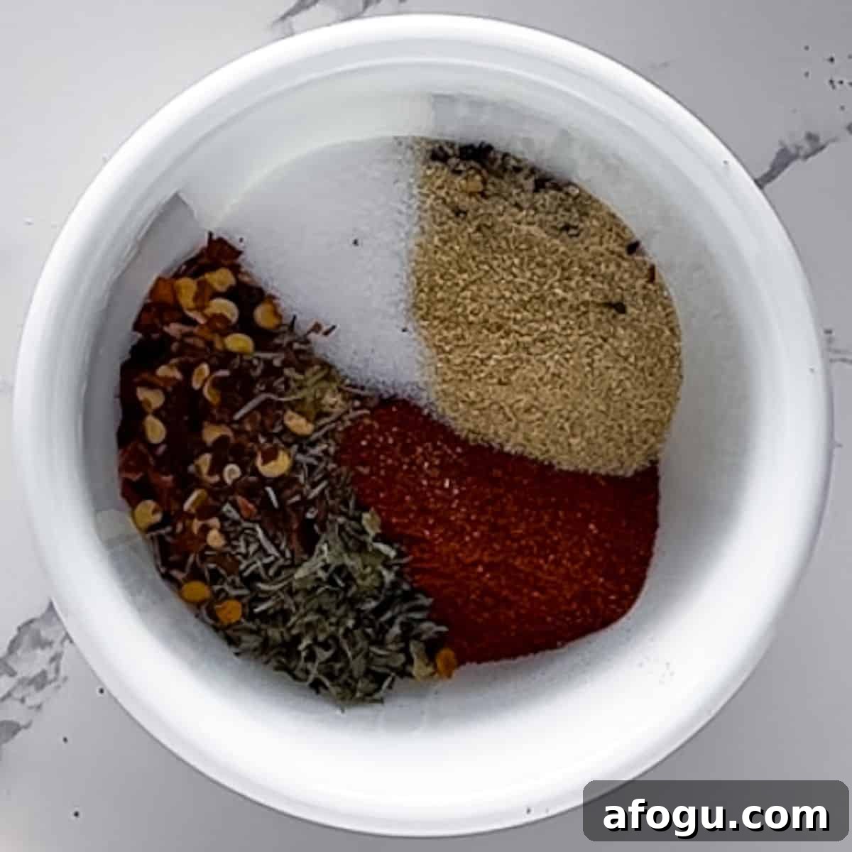 All the spices and herbs in one bowl.