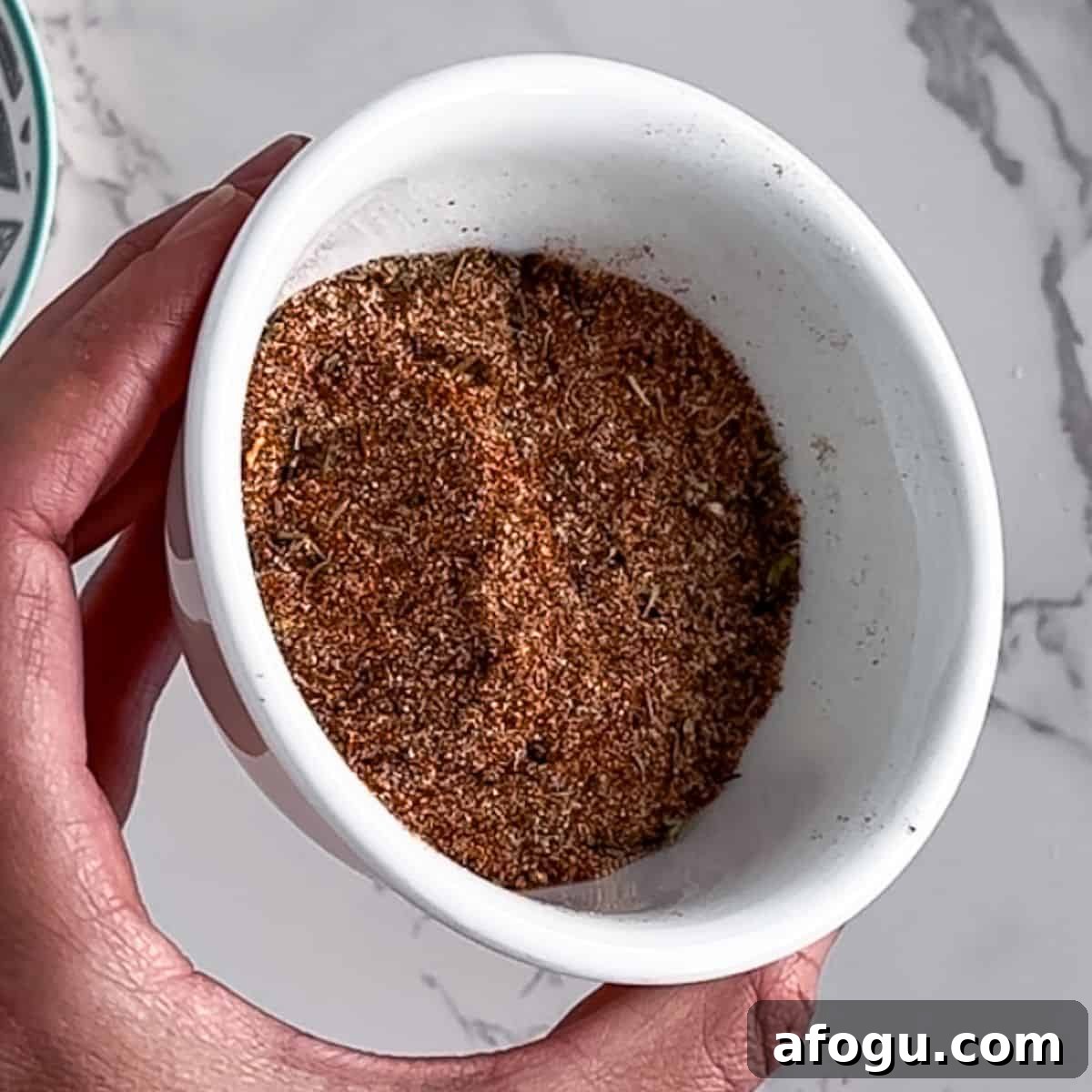 Mixing the spices and herbs together.
