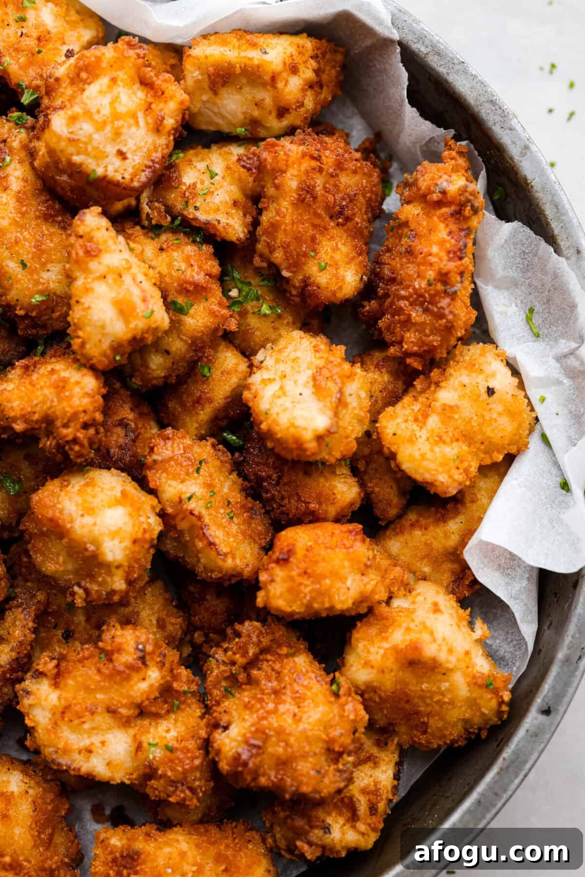 A close up of chick-fil-a nuggets on a platter. 