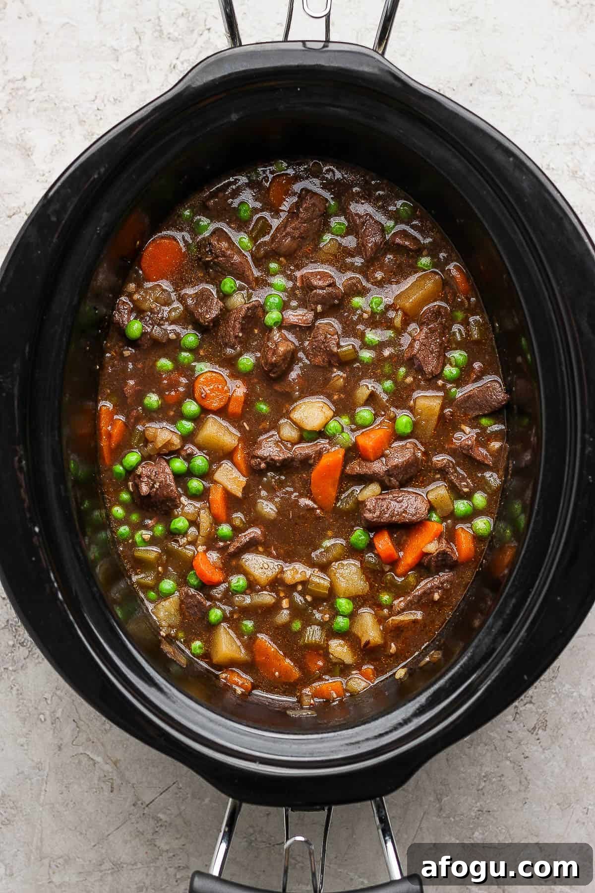 A crockpot full of venison stew. 