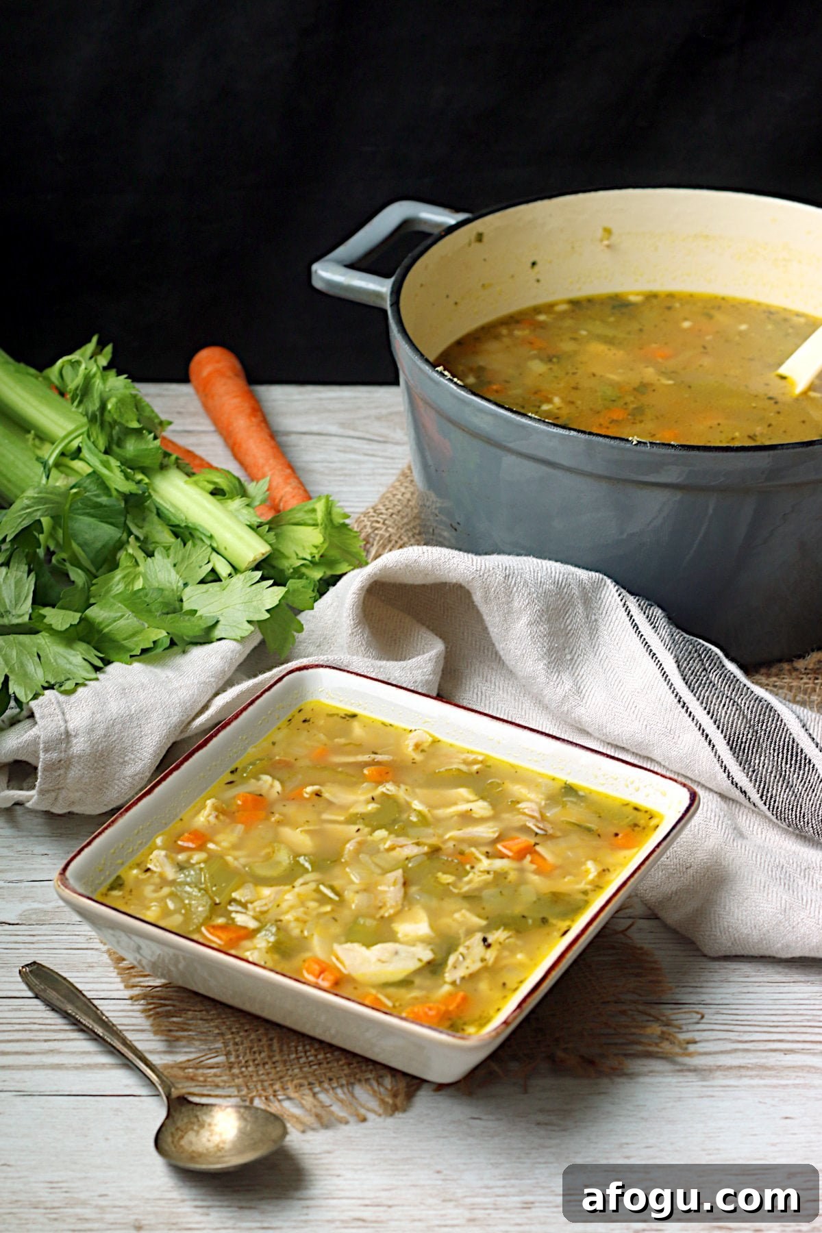 Leftover Rotisserie Chicken Noodle Soup Recipe for Quick Comfort 4 Homemade Leftover Rotisserie Chicken Noodle Soup in a square white bowl