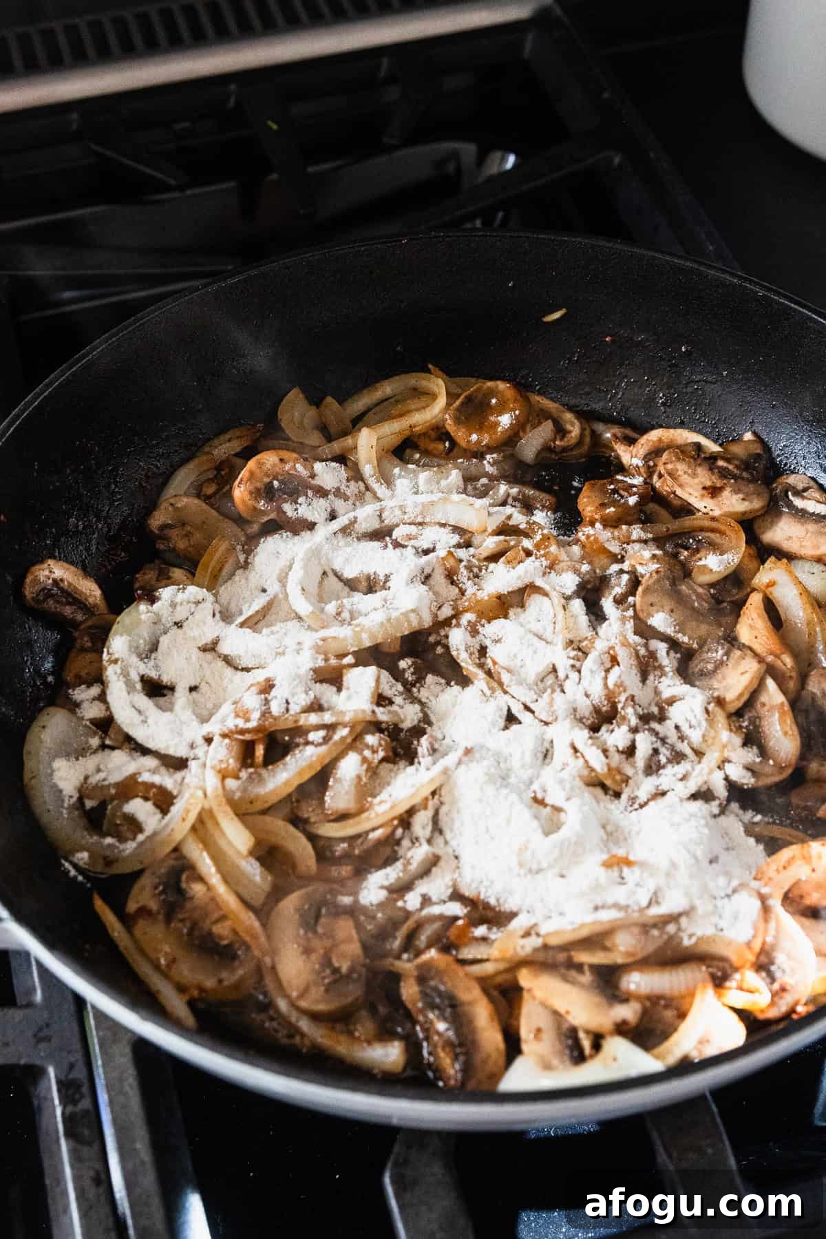 Flour added to the cooked vegetables to make a gravy.