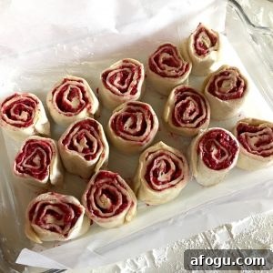 Flaky Blackberry Sweet Rolls with Vanilla Glaze 4 Arranged rolls in pan