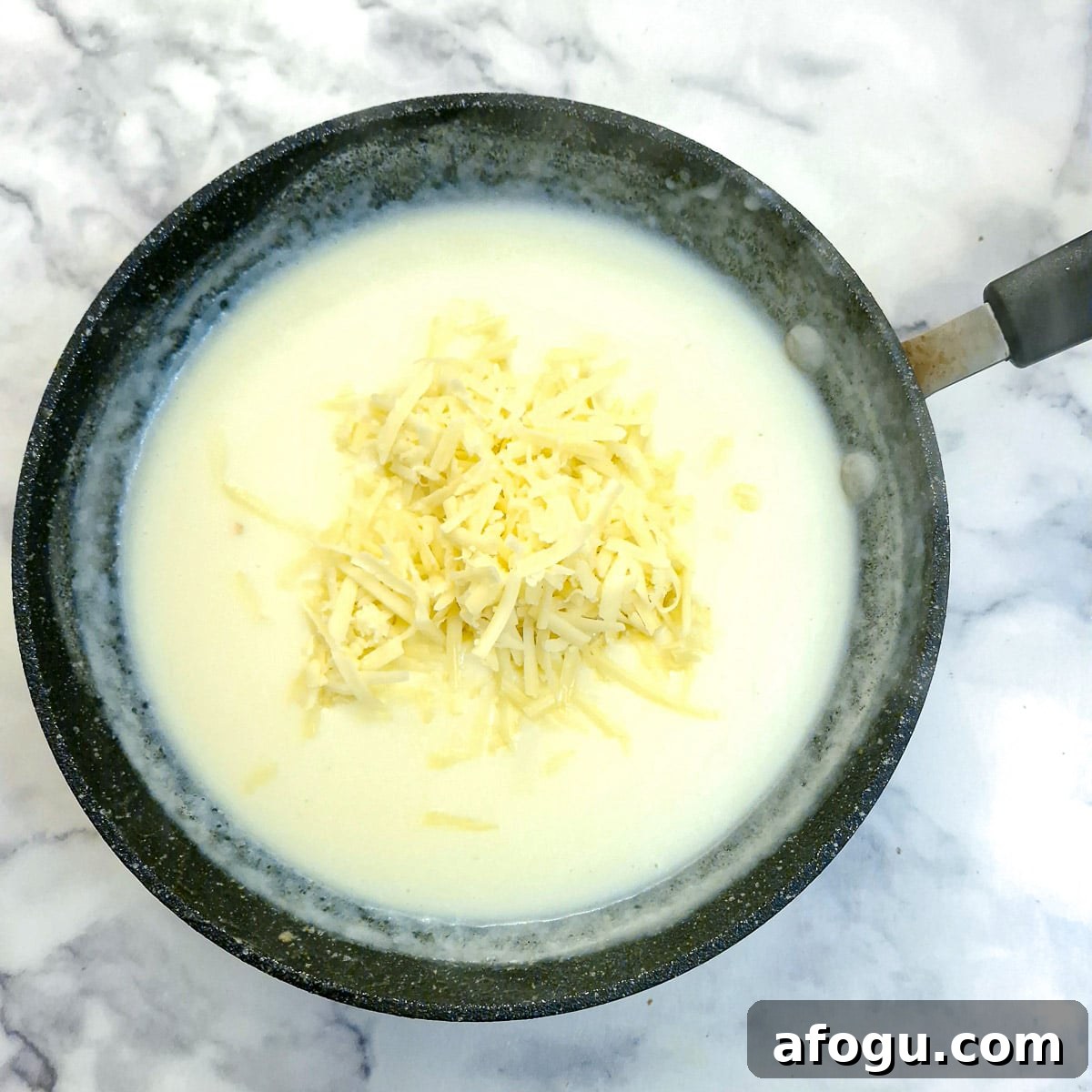 Grate cheese added to the bechamel sauce.
