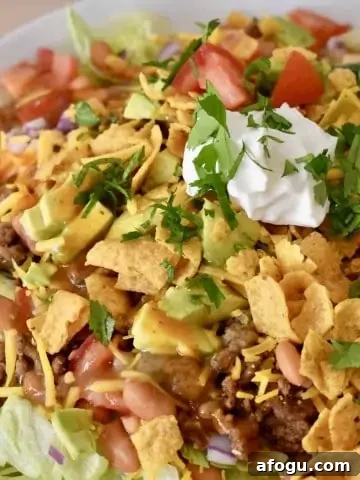 Frito Taco Salad in a white serving bowl.
