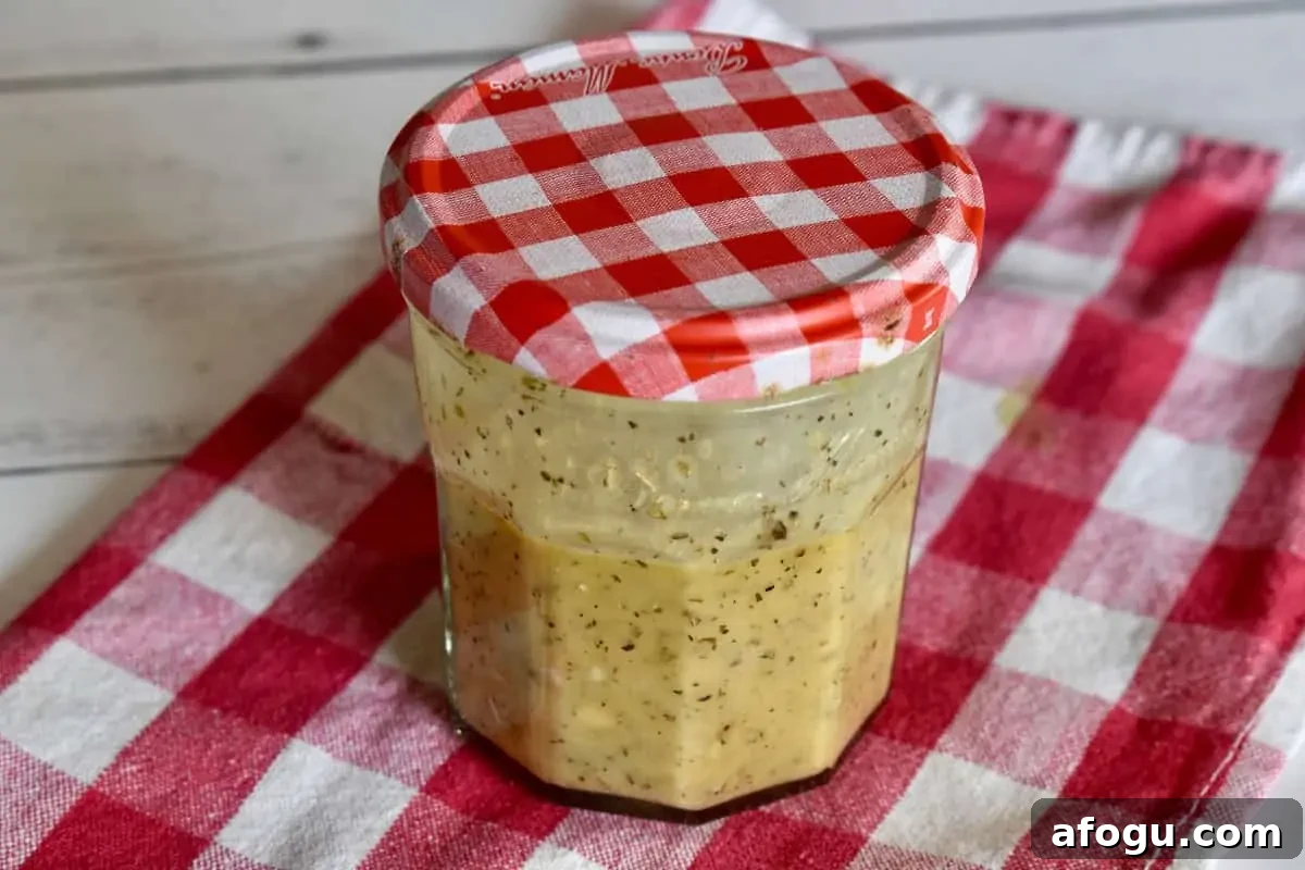 Dressing in a small glass jar. 
