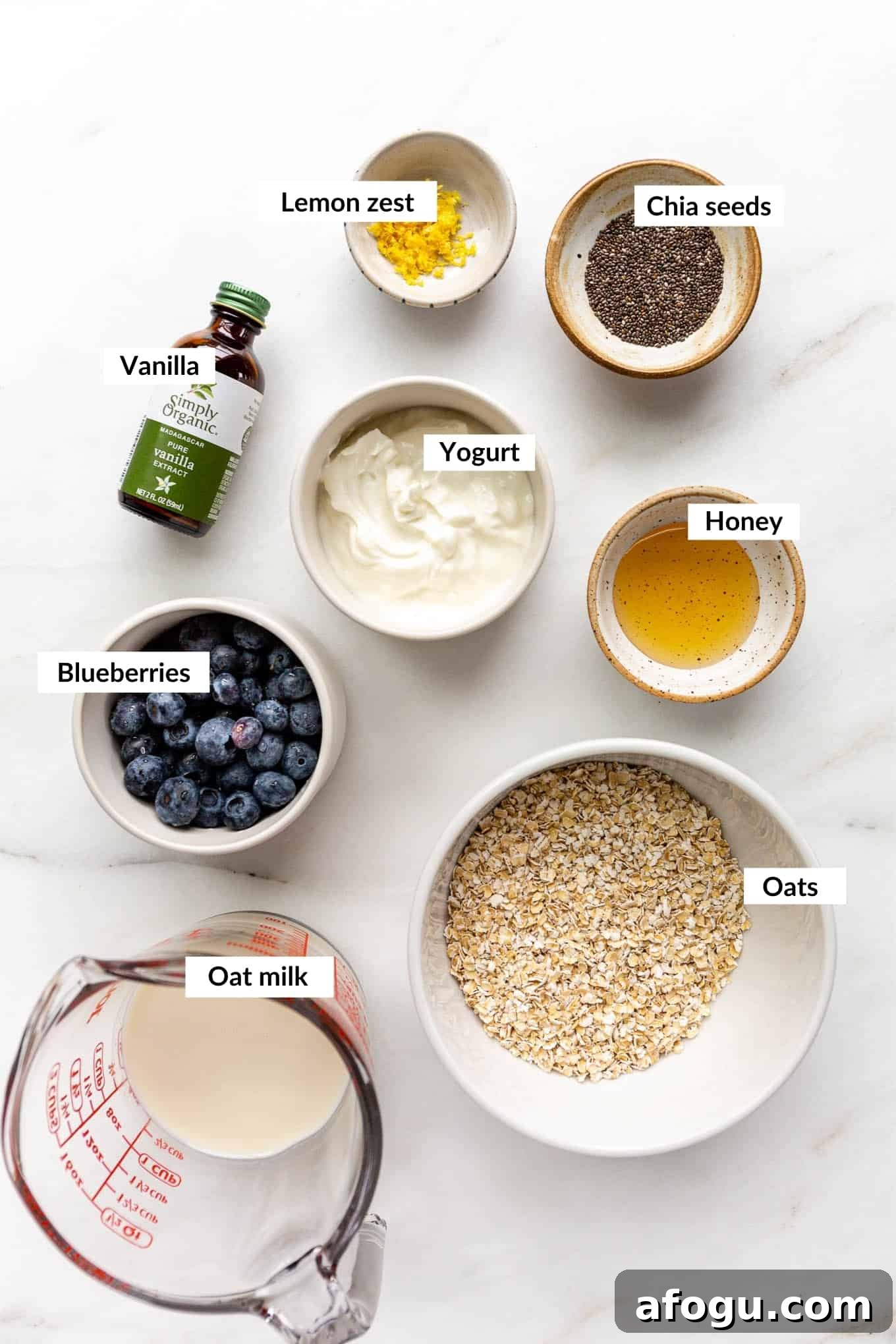 A flat lay of ingredients to make blueberry overnight oats