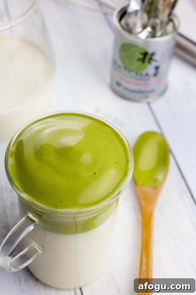 Dalgona Matcha Latte Recipe: Whipped Green Tea Coffeehouse Drink 12 Dalgona matcha latte before matcha powder dusting.