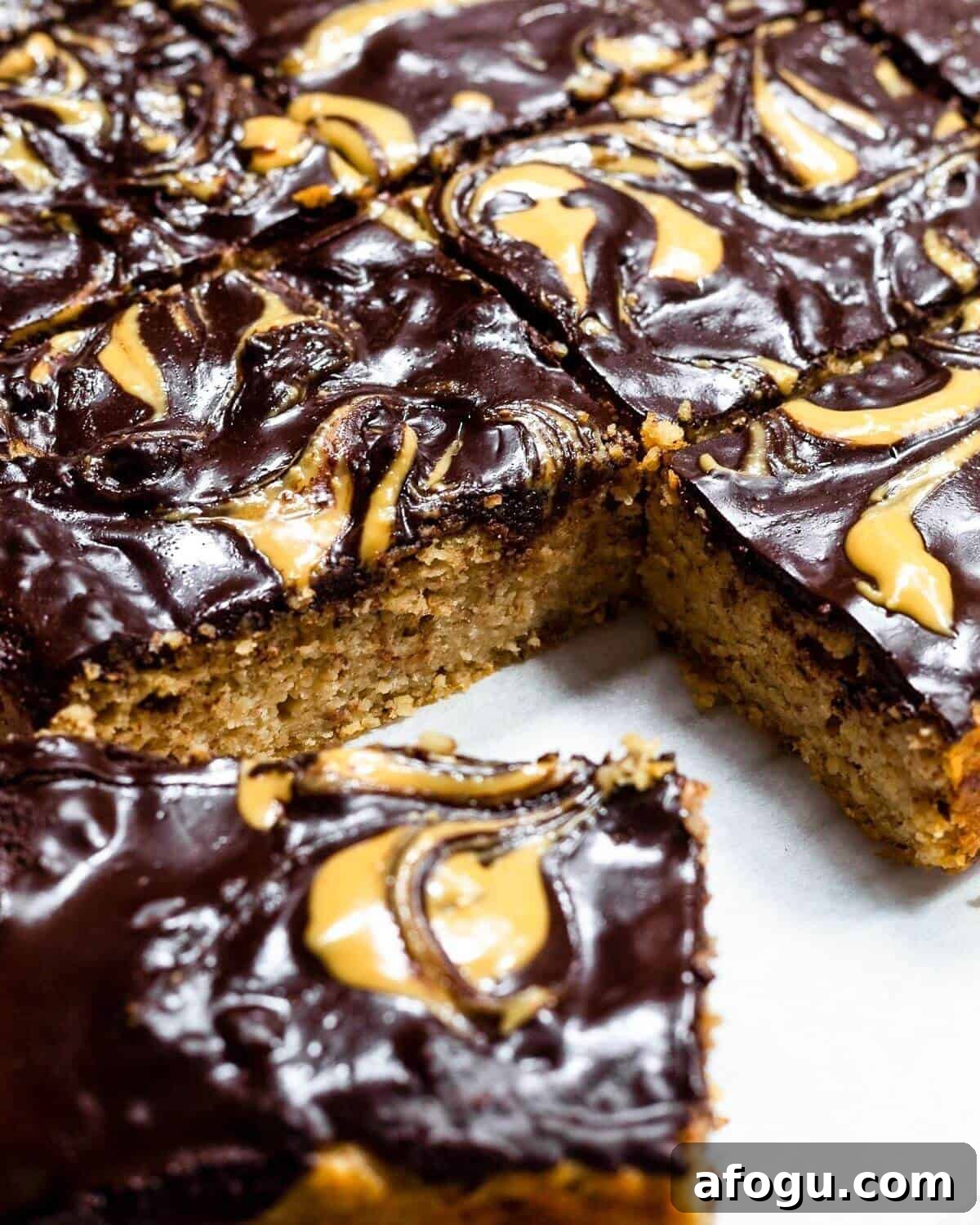 A sliced peanut butter sheet cake.