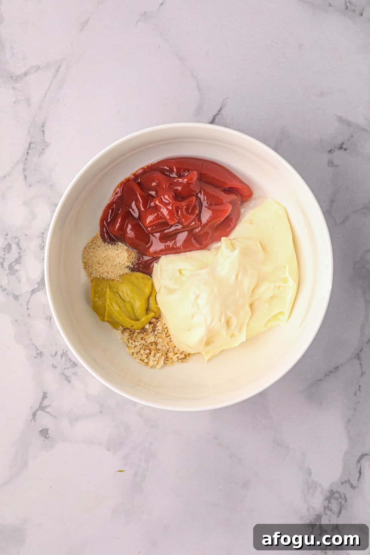 Homemade Burger Sauce Recipe: Tangy, Creamy, and Quick 4 Burger Sauce ingredients in mixing bowl
