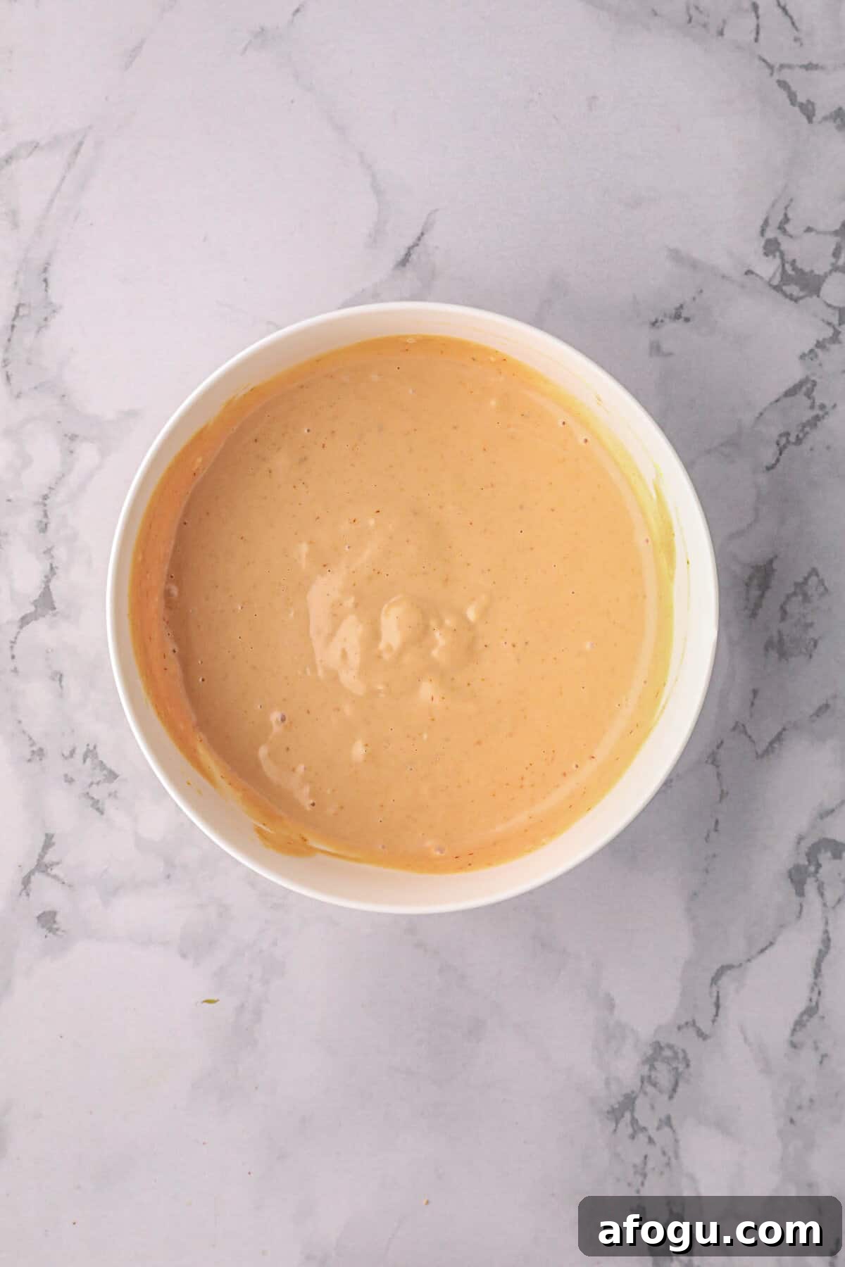 Homemade Burger Sauce Recipe: Tangy, Creamy, and Quick 5 Combined burger sauce ingredients in mixing bowl