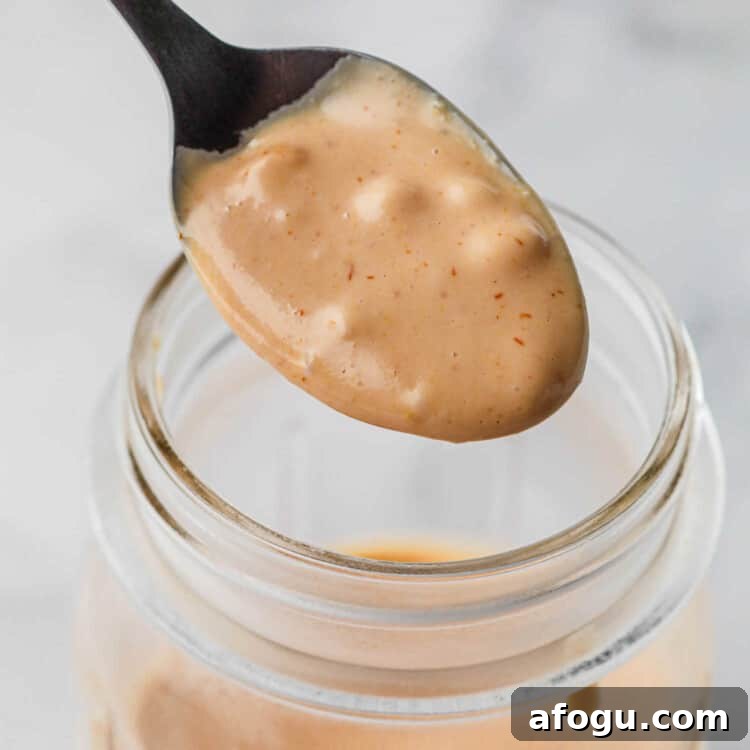 Homemade Burger Sauce Recipe: Tangy, Creamy, and Quick 8 Burger Sauce on spoon cropped Square