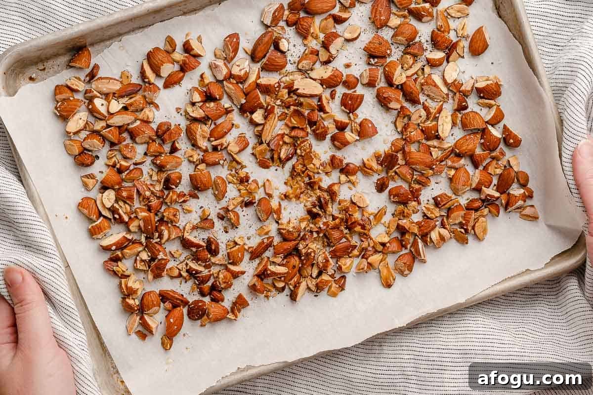 toasted almonds on baking sheet