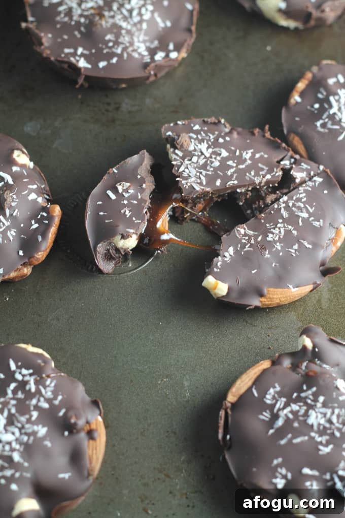 a caramel nut turtle broken into pieces to show the carmel centre