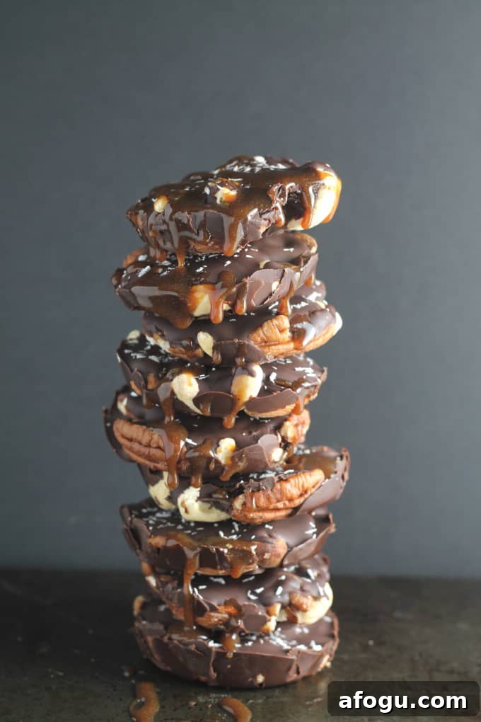 chocolate caramel christmas treats in a tower drizzled with caramel sauce