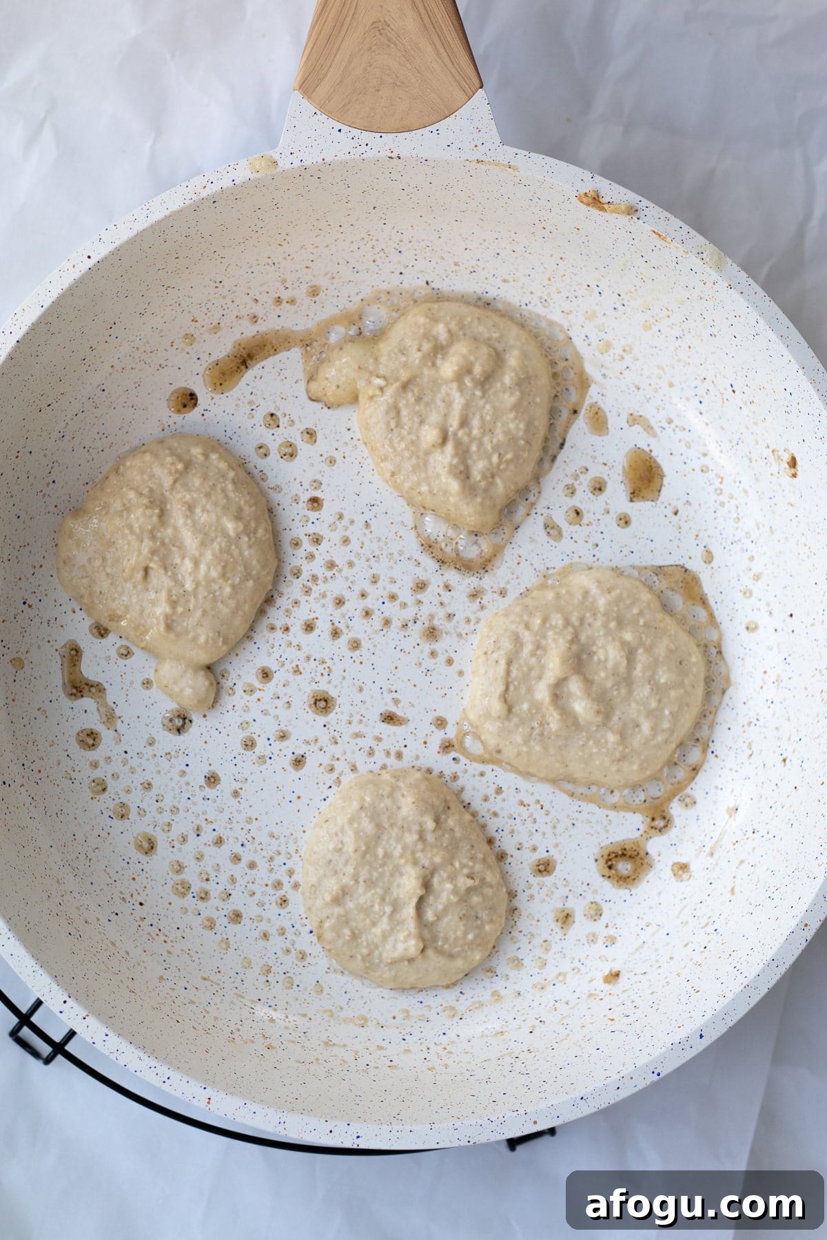 6-Ingredient Cottage Cheese Oatmeal Pancakes Recipe 7 cottage cheese oatmeal pancake batter in a frying pan