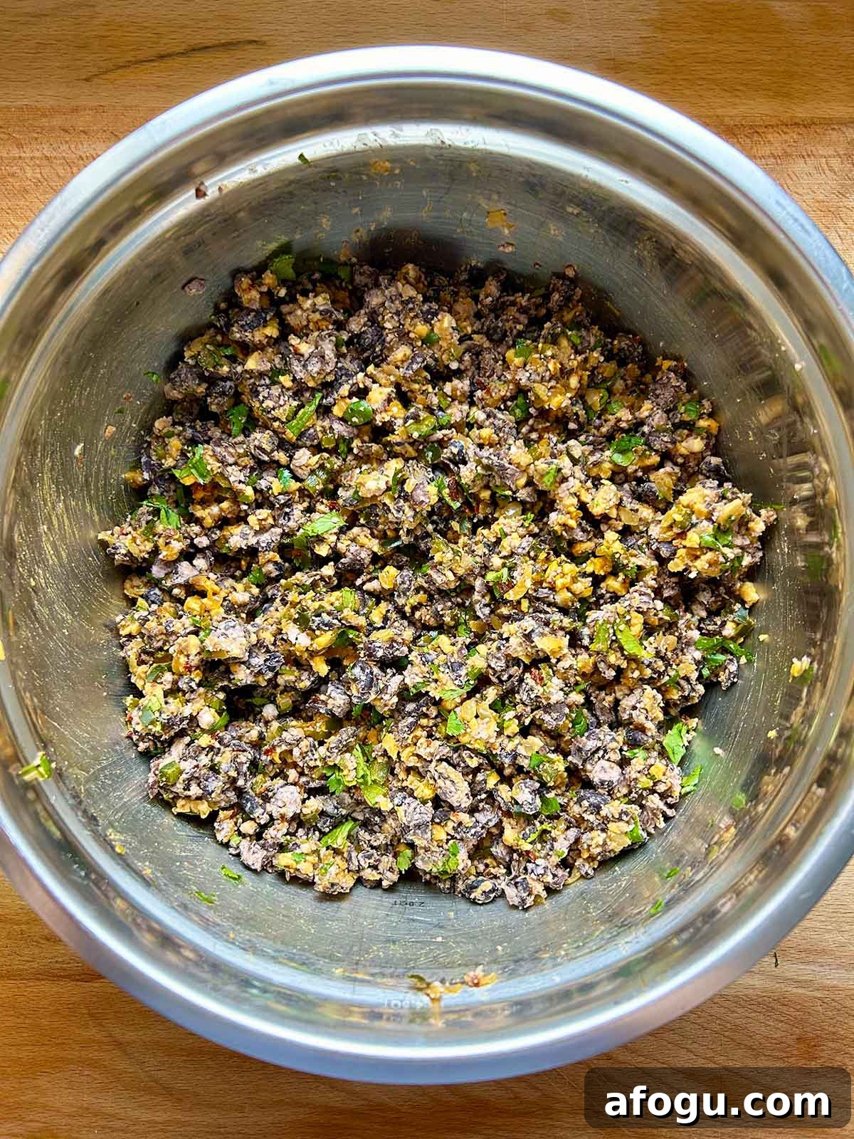 onion and black beans mixed in bowl