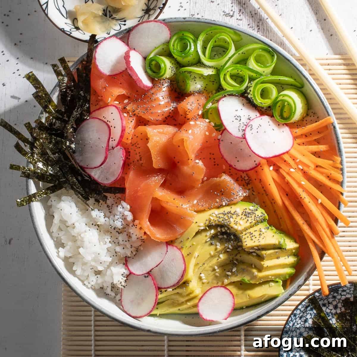 Showing how to arrange a sushi salad.