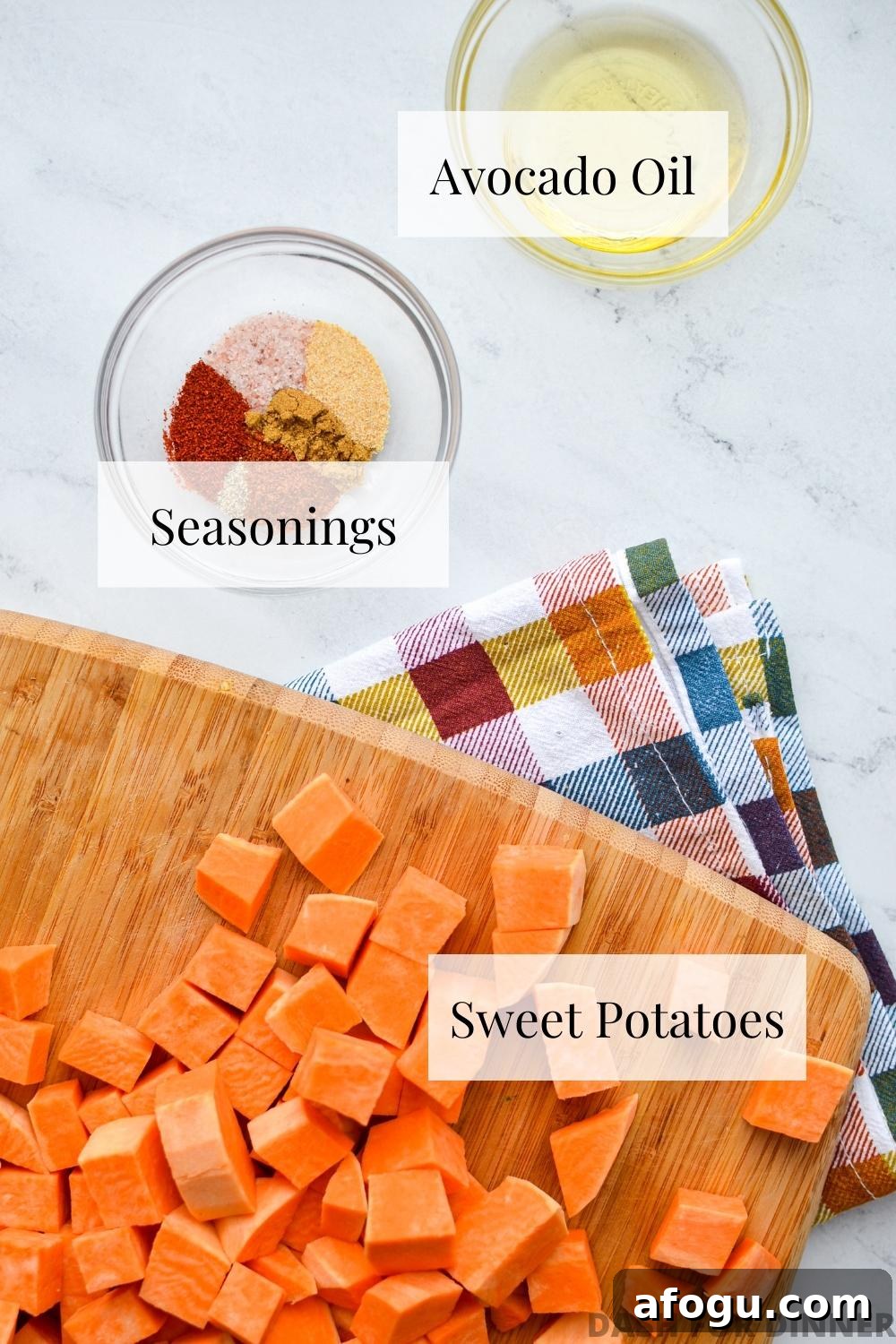 Crispy Air Fryer Sweet Potato Cubes Recipe 3 The ingredients needed to make air fryer roasted sweet potato chunks.