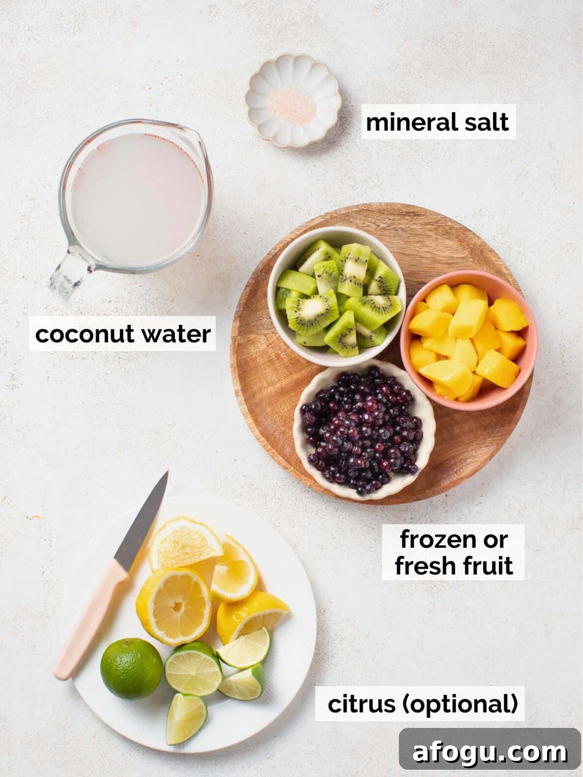 Fruit and coconut water on a white background.