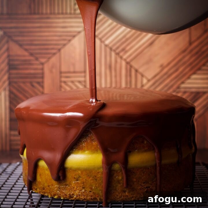 Pouring warm chocolate ganache over a two layer cake so the ganache covers the top and the sides of the cake.