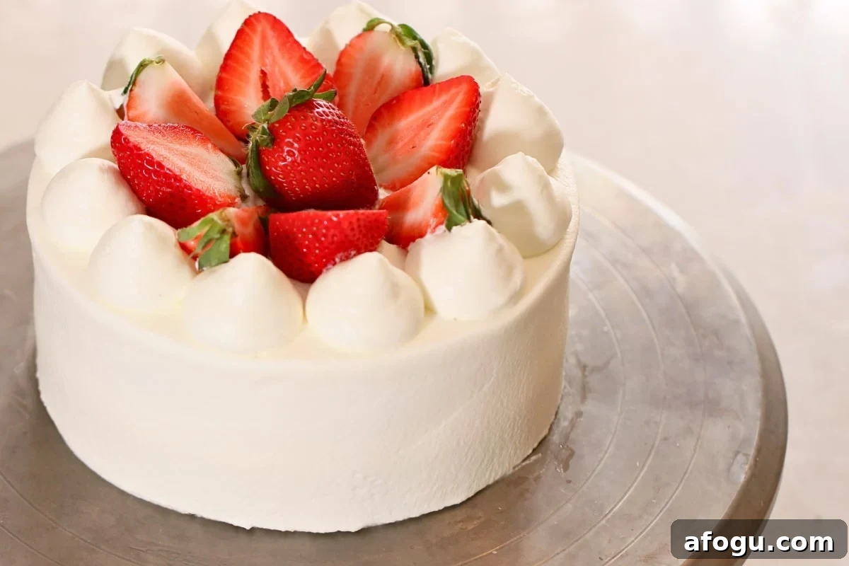 Japanese Strawberry Shortcake Recipe: Fluffy Shortcake with Fresh Strawberries 4 A homemade fluffy Japanese strawberry shortcake on a turntable.