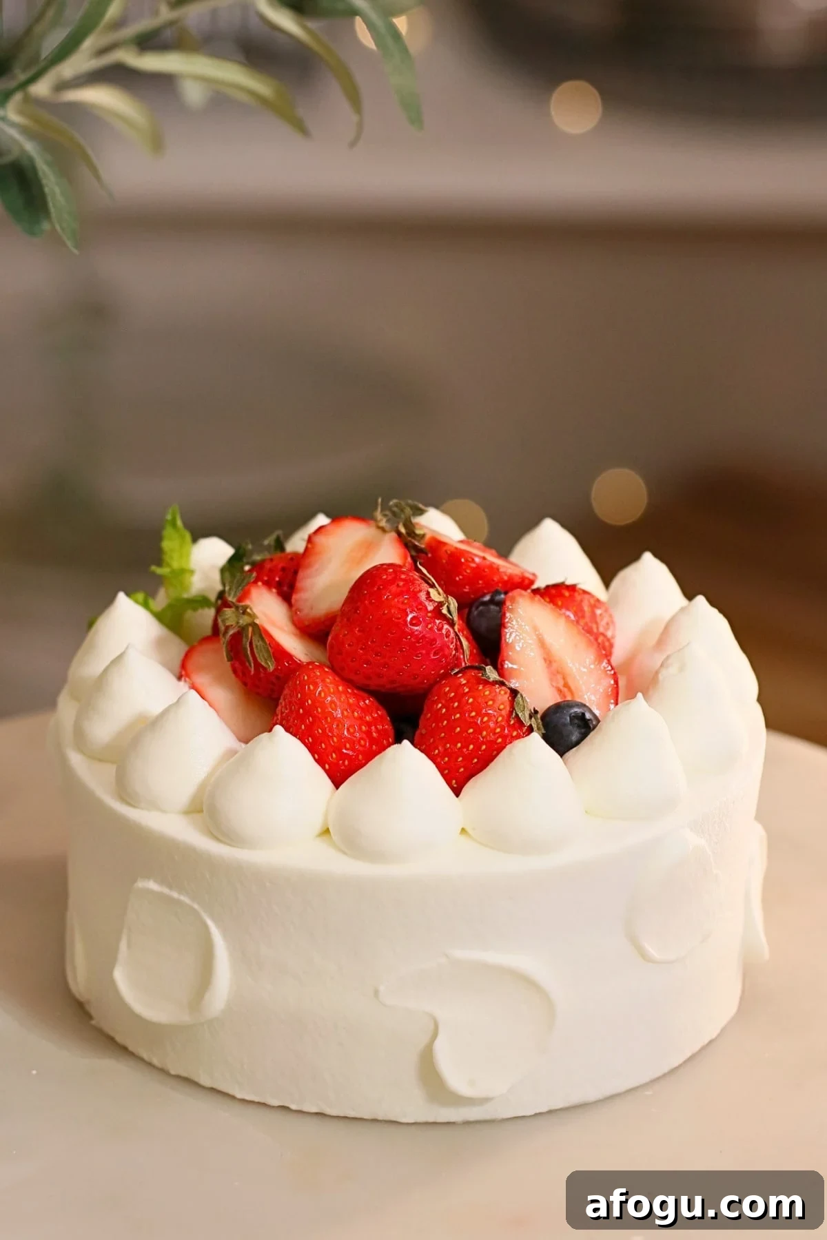 Japanese Strawberry Shortcake Recipe: Fluffy Shortcake with Fresh Strawberries 15 A classic Japanese strawberry shortcake on a turntable.