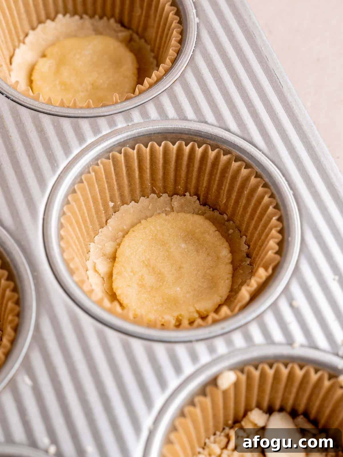 Shortbread cookie dough with almond filling on top.