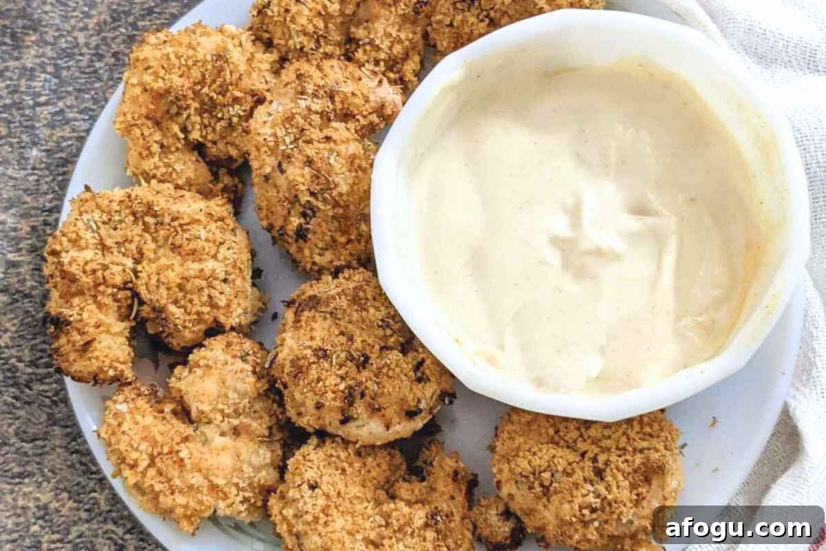 Crispy shrimp with bang bang sauce on a plate