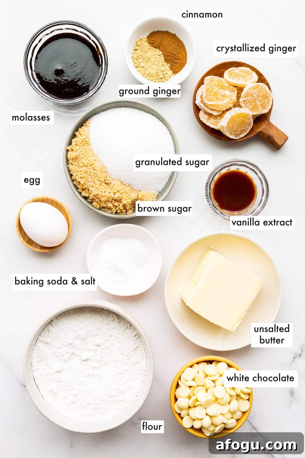 Ingredients to make white chocolate ginger cookies measured out and ready to be mixed.