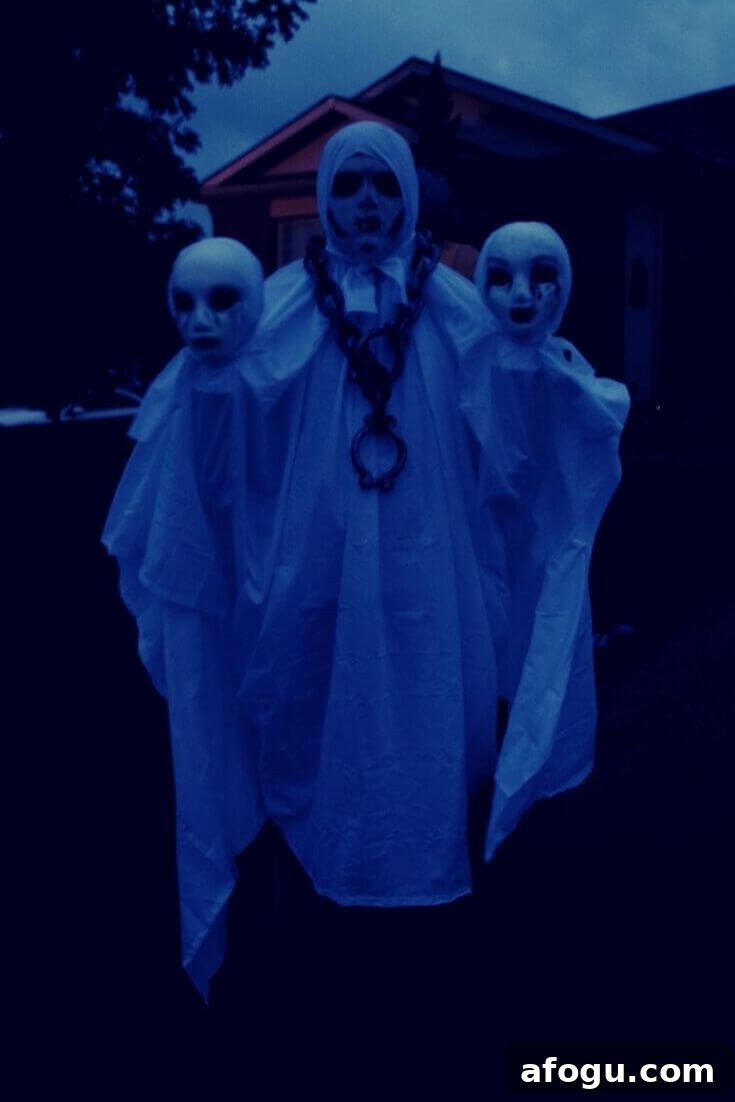 A very dark view of the three-headed ghost halloween costume