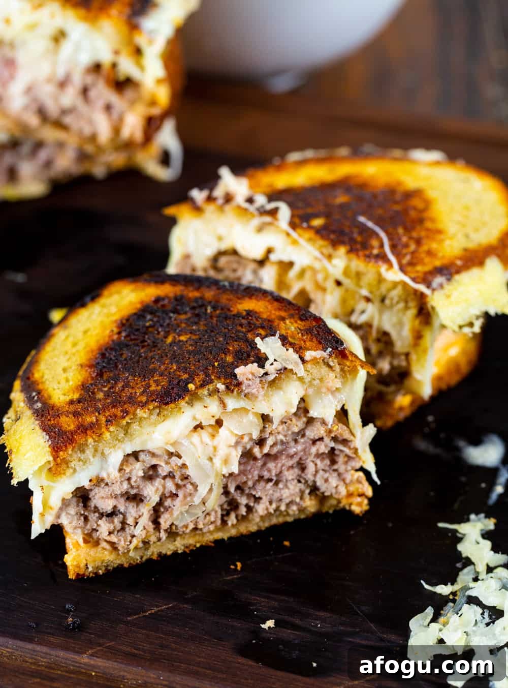 Turkey Reuben Patty Melt with Turkey Burger Patties 4 Patty Melt cut in half.
